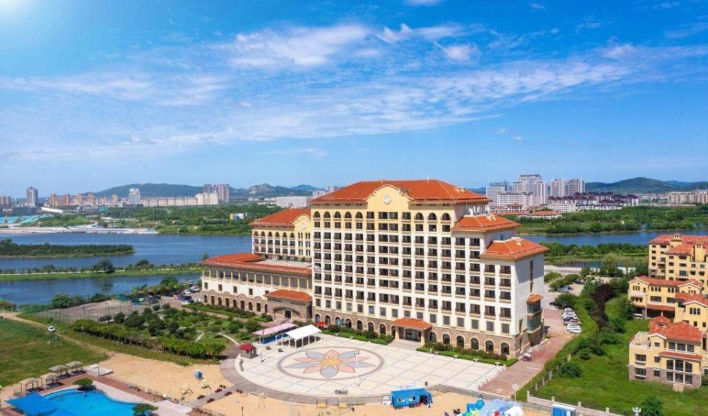 Haiyang Shenglong Jianguo Hotel Fengcheng  Экстерьер фото