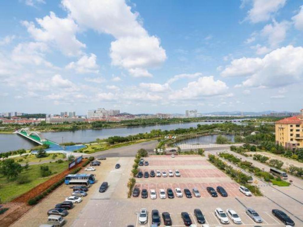 Haiyang Shenglong Jianguo Hotel Fengcheng  Экстерьер фото