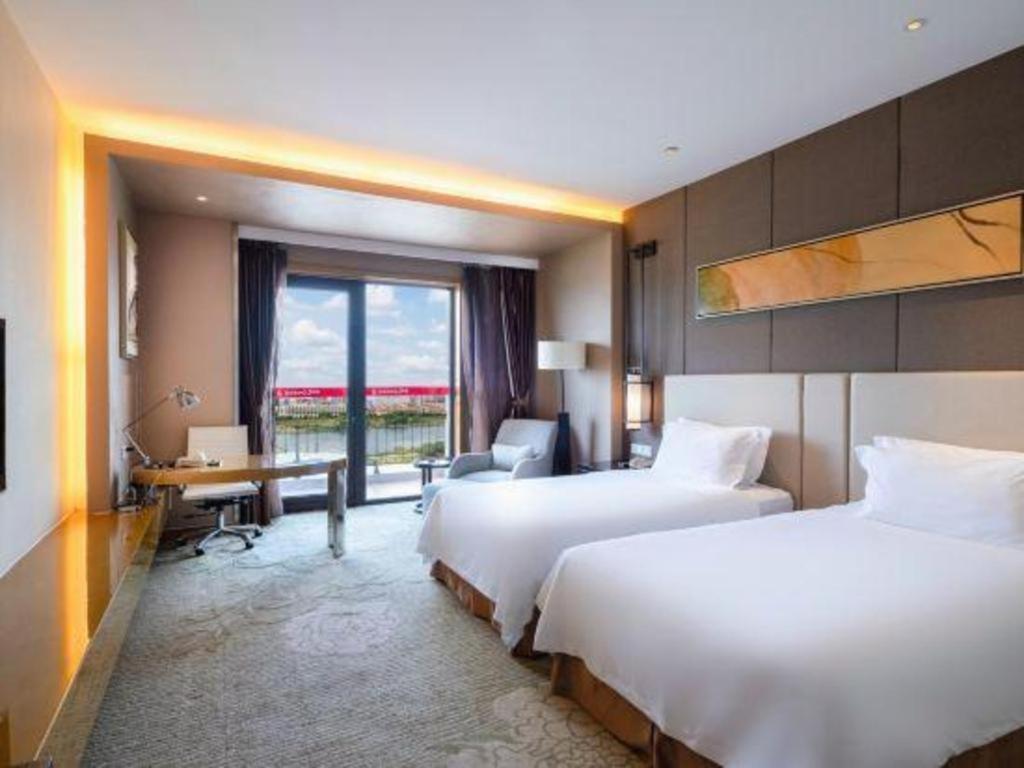 Haiyang Shenglong Jianguo Hotel Fengcheng  Экстерьер фото