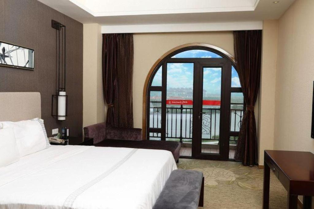 Haiyang Shenglong Jianguo Hotel Fengcheng  Экстерьер фото