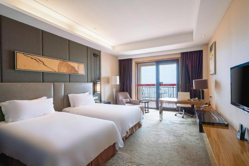 Haiyang Shenglong Jianguo Hotel Fengcheng  Экстерьер фото